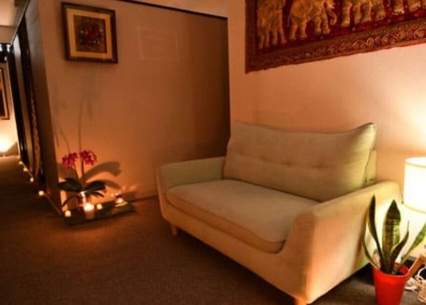 Cozy lounge at BaanMai Thai Massage and Spa in Tokyo, Minato-Ku, JP. Warm lighting and calming decor.