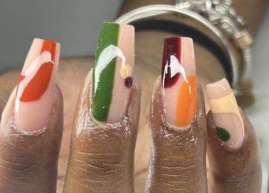 Colorful nail art at Bahama Beauty Nail Bar, Nassau, New Providence, BS. Unique designs and vibrant colors.