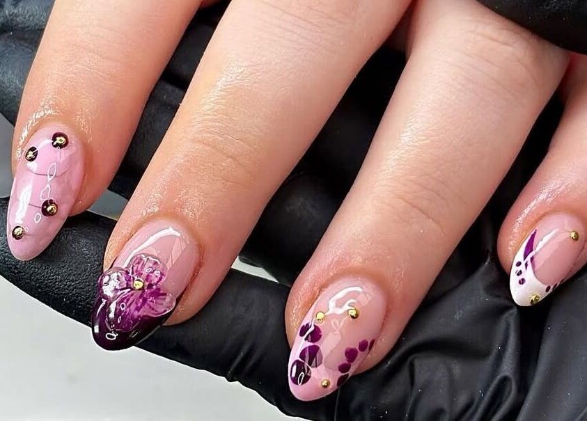 Elegant pink and purple floral nail art at Nails by Kyra M, Scunthorpe, England, GB.
