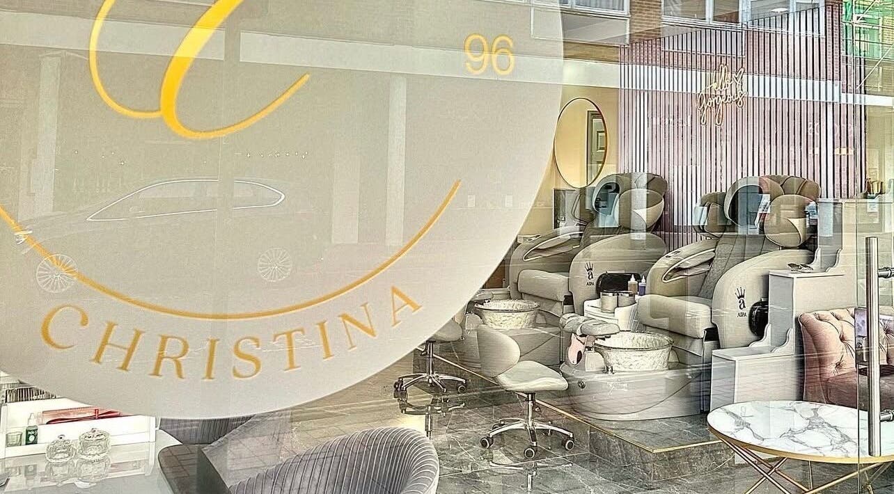 Chic interior of Nails by Christina, Solihull, England, GB with plush seating and nail stations.