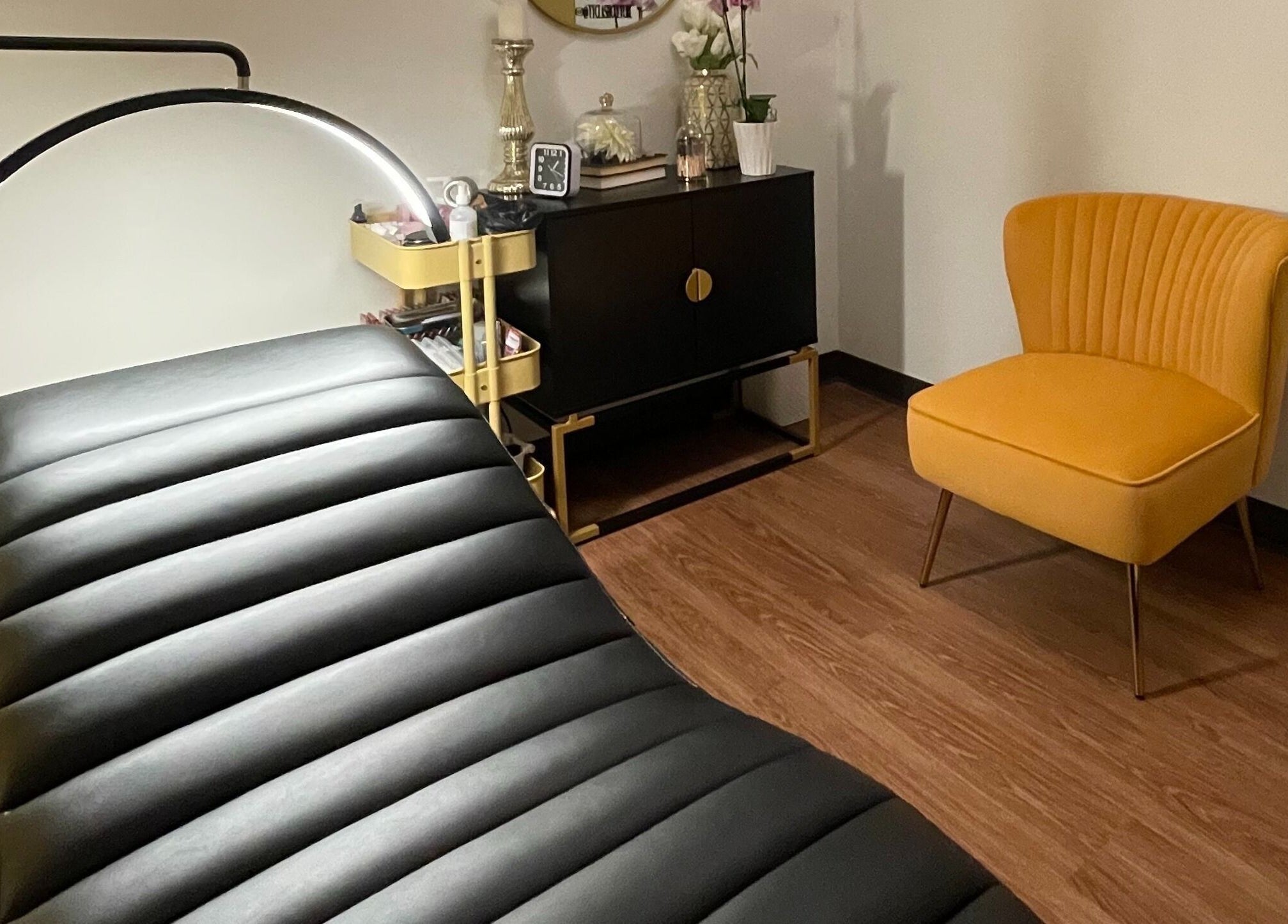 Lash Culture spa room with elegant decor and treatment bed in Calgary, Alberta, CA.