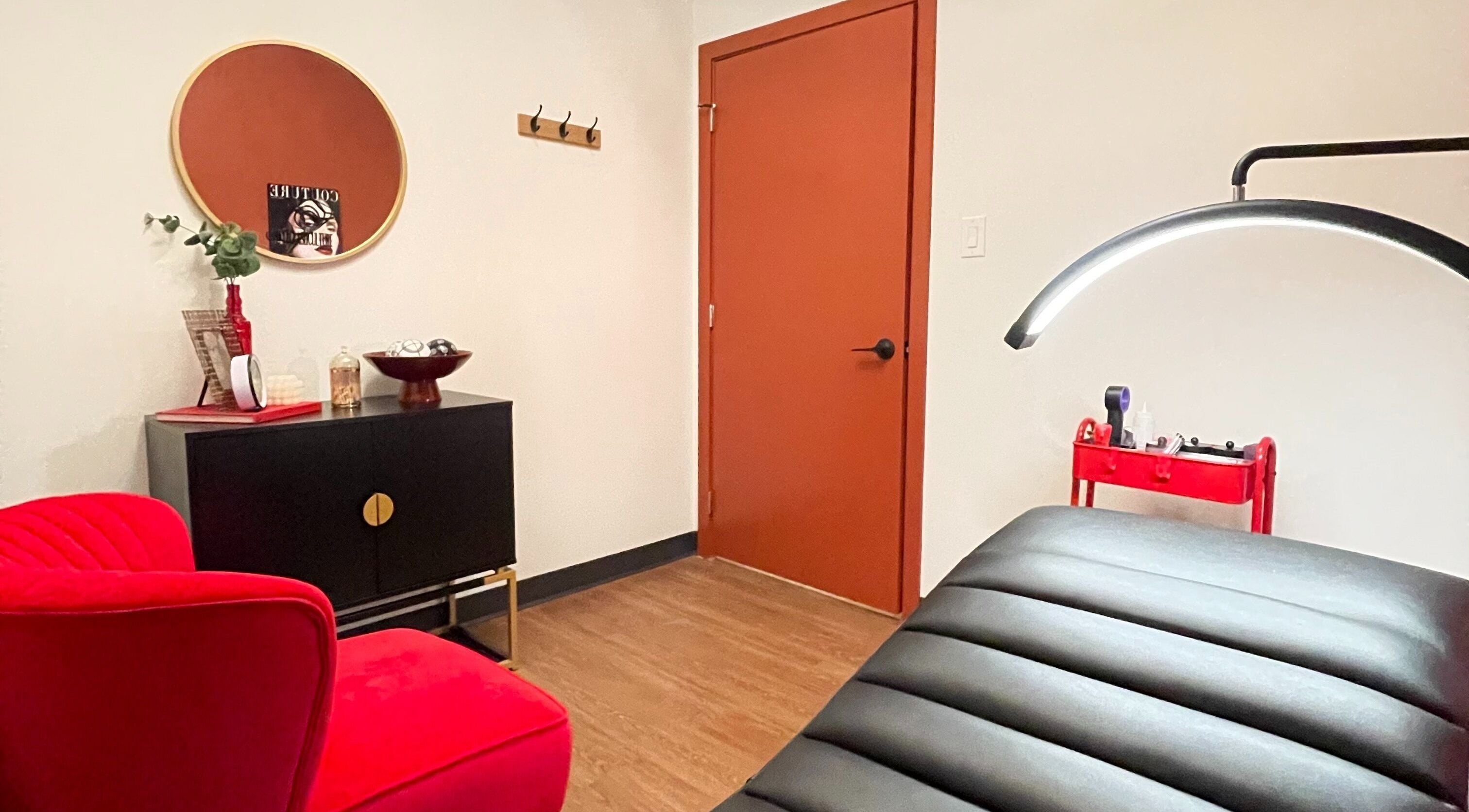 Elegant treatment room at Lash Culture in Calgary, Alberta, CA featuring modern decor and comfortable seating.