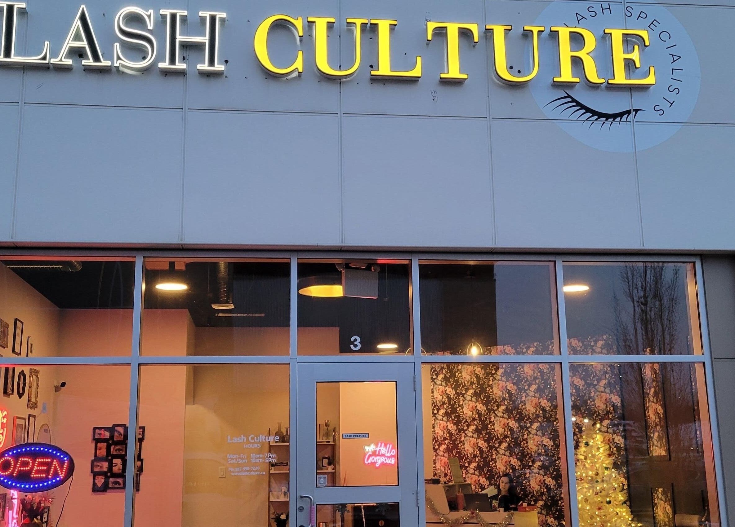 Front view of Lash Culture in Calgary, Alberta, CA with bright signage and welcoming entrance.