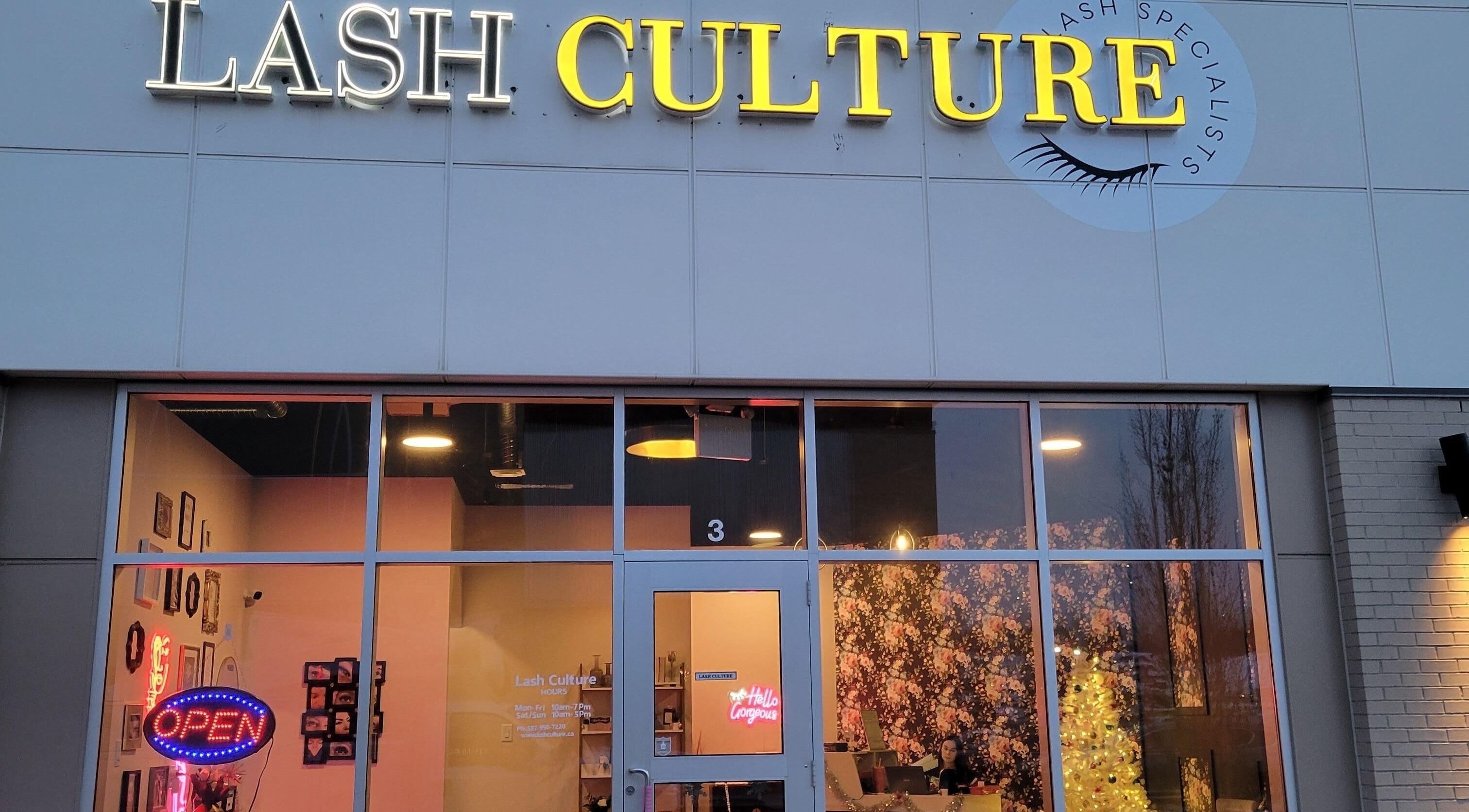 Front view of Lash Culture in Calgary, Alberta, CA with bright signage and welcoming entrance.