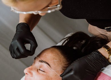 Expert eyebrow threading at Nuè Atelier, Port Kennedy, Western Australia, AU. Superior beauty treatment shown.