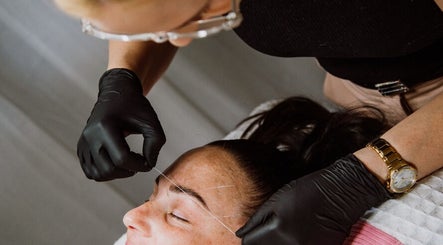 Expert eyebrow threading at Nuè Atelier, Port Kennedy, Western Australia, AU. Superior beauty treatment shown.