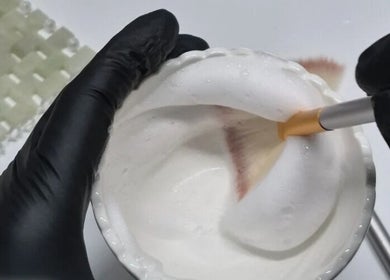 Expert hand crafts facial foam at Nuè Atelier, Port Kennedy, Western Australia, AU.