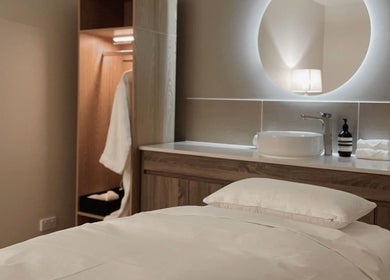 Serene treatment room at LA MED Skin, Melbourne, Victoria, AU, highlighting modern amenities.