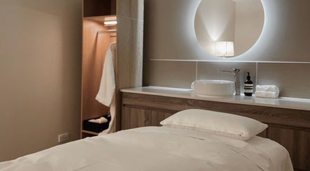 Serene treatment room at LA MED Skin, Melbourne, Victoria, AU, highlighting modern amenities.