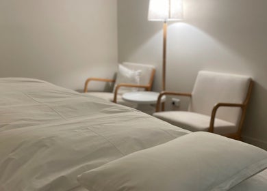 Relaxing therapy room with cozy chairs at LA MED Skin, Melbourne, Victoria, AU for ultimate wellness.