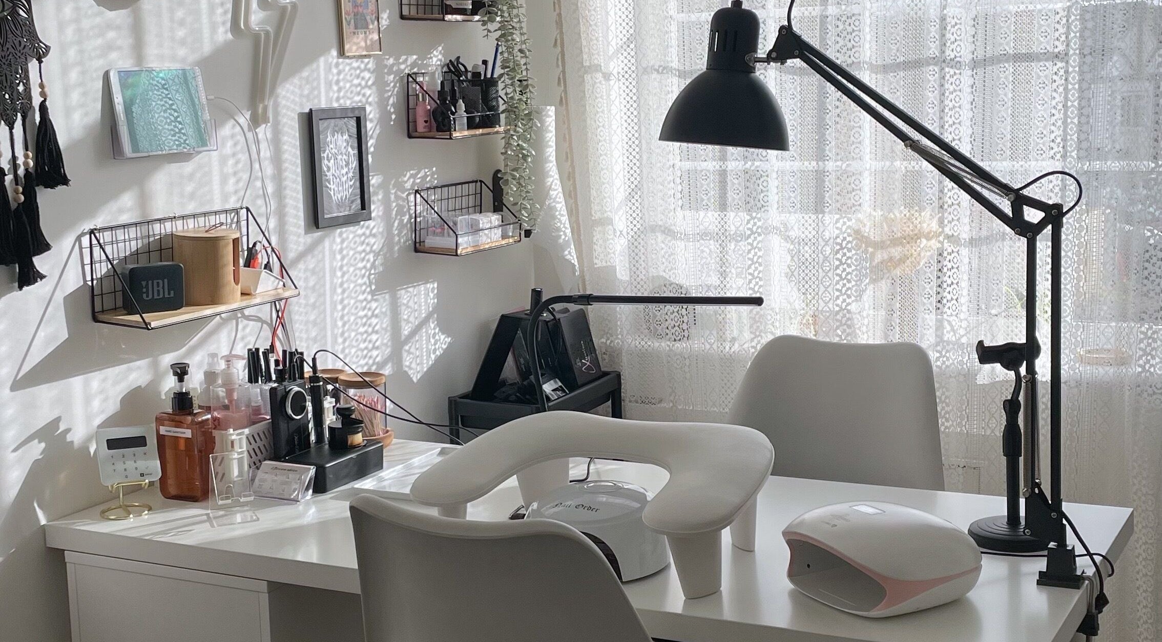 Modern nail salon workspace at BeautyBits, Bristol, England, GB, featuring elegant decor and equipment.