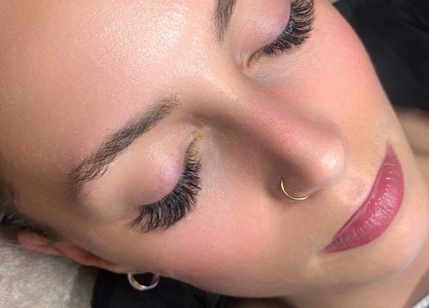 Woman with eyelash extensions at Feather Aesthetics, Bloemfontein, Free State, ZA.