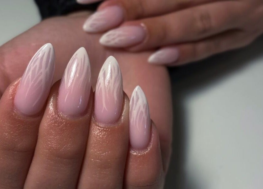 Elegant pink and white nails designed at Feather Aesthetics, Bloemfontein, Free State, ZA.