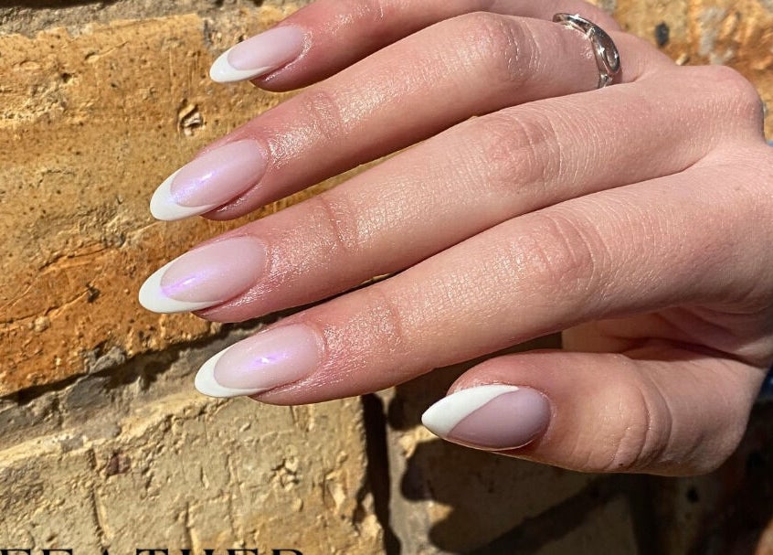 Elegant manicure at Feather Aesthetics, Bloemfontein, Free State, ZA showcasing flawless nail art.