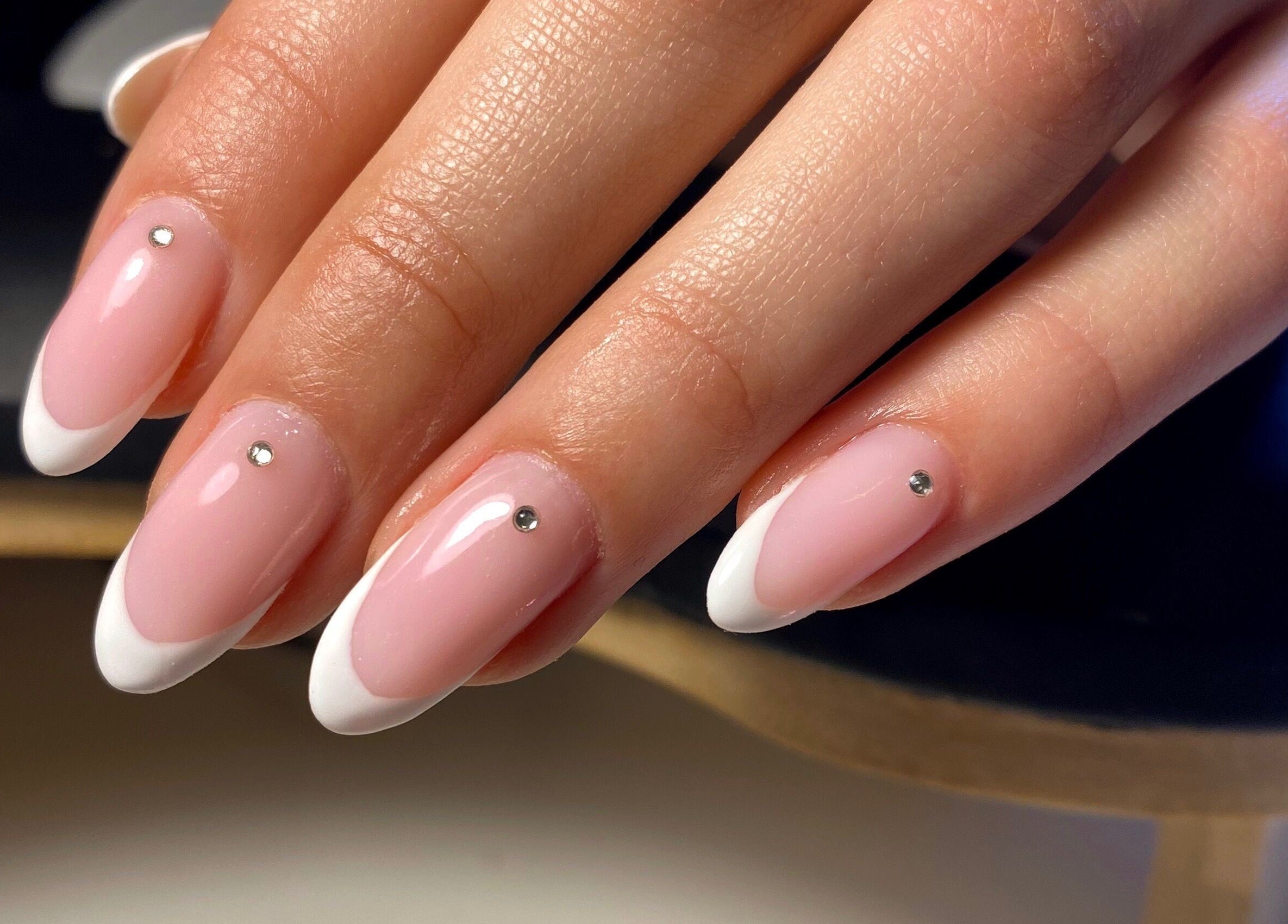 French manicure with gemstones at Feather Aesthetics, Bloemfontein, Free State, ZA.