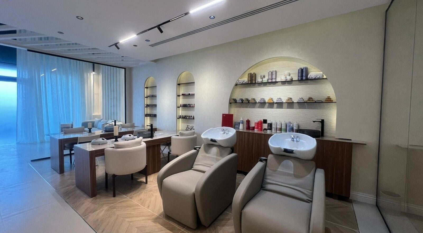 Relaxing interior of Elee Belle featuring styling stations and shelves, Al Khobar, Eastern Province, SA.