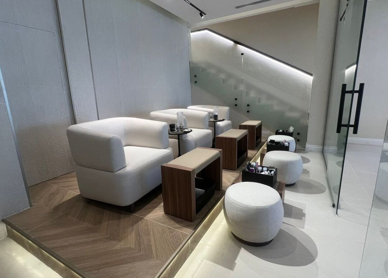 Chic manicure lounge at Elee Belle, Al Khobar, Eastern Province, SA. Stylish seating with modern decor.