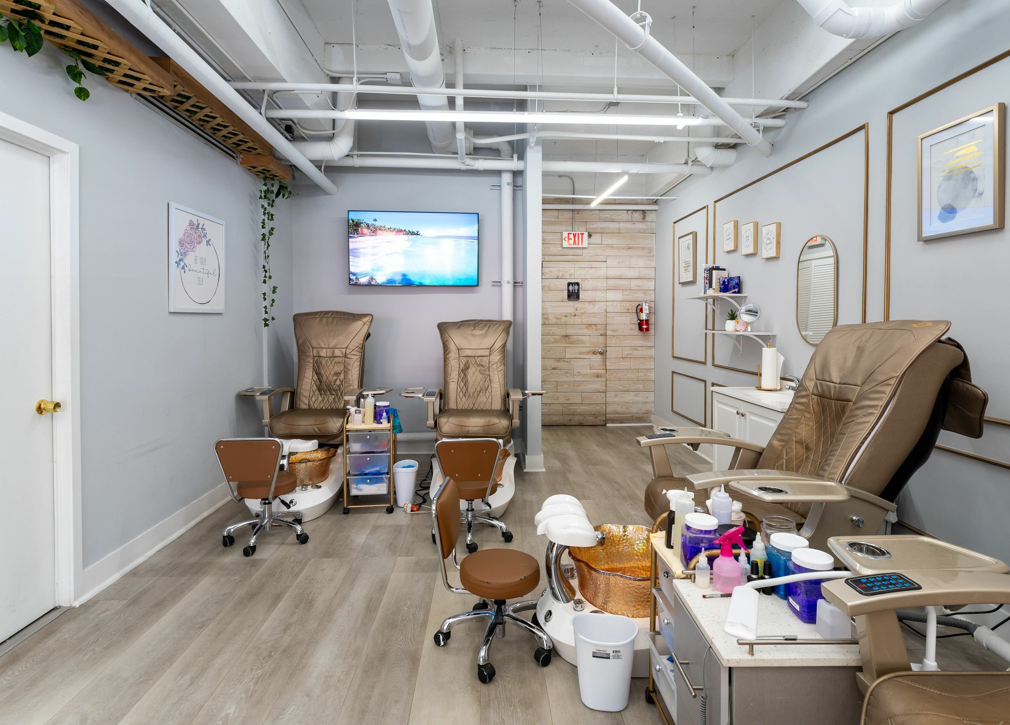 Tranquil pedicure chairs at Nail Nova Salon & Spa, Miami Lakes, Florida, US offer a relaxing experience.