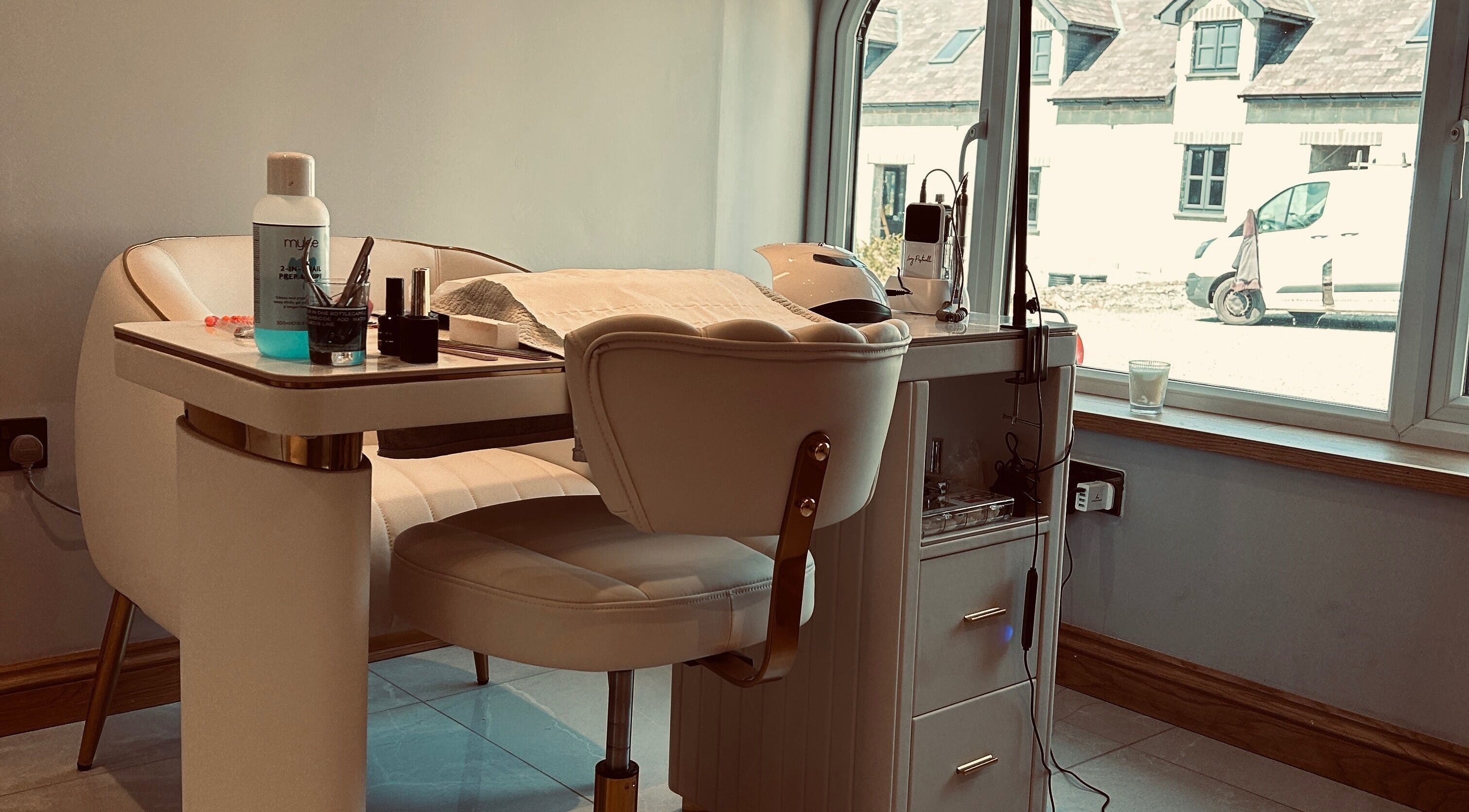Elegant manicure setup at Biwti Mer in Gorsgoch, Wales, GB, featuring stylish chair and nail tools.