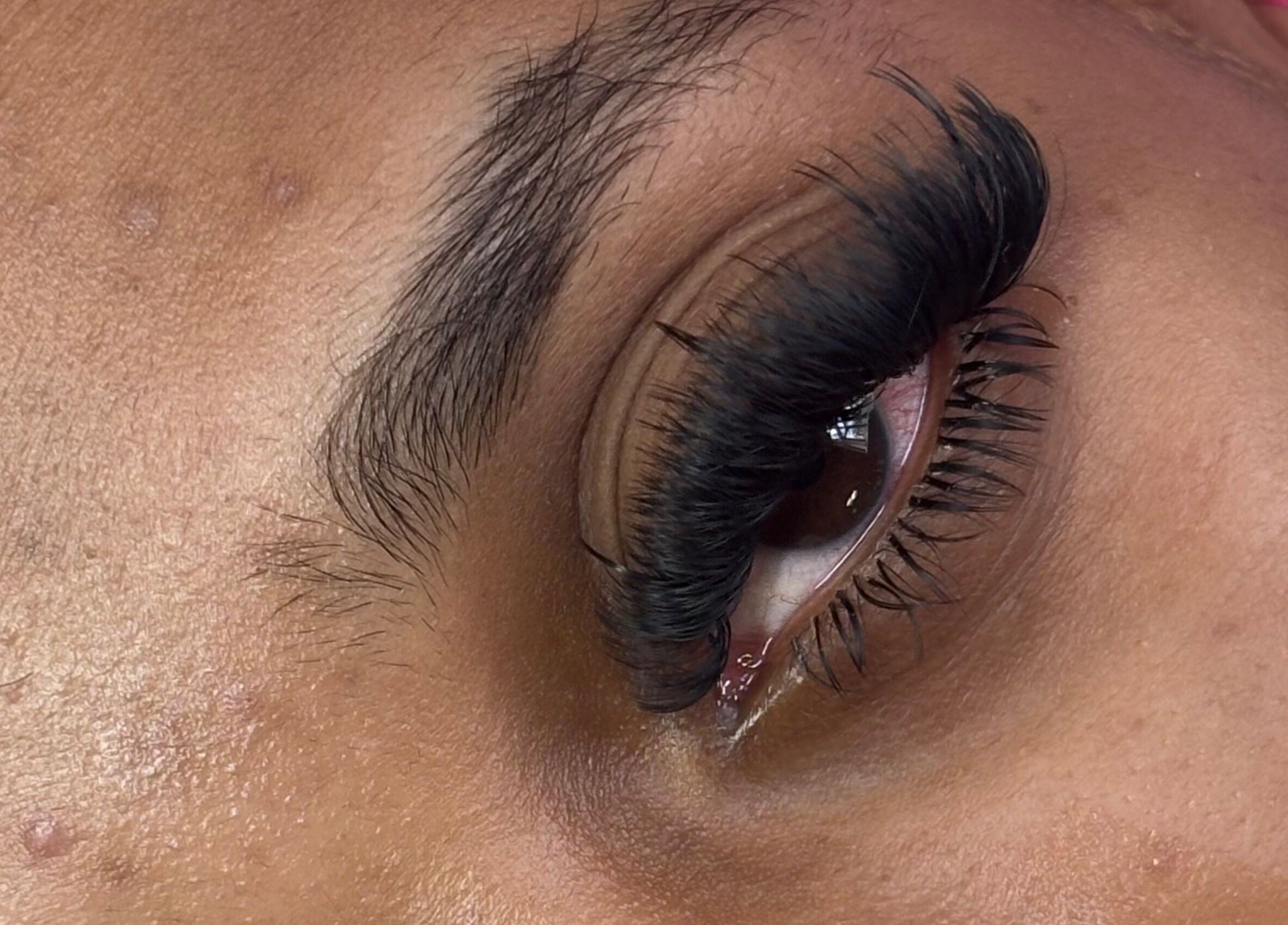 Close-up of expertly applied eyelash extensions at Glam Aura Studio in Leeds, England, GB.