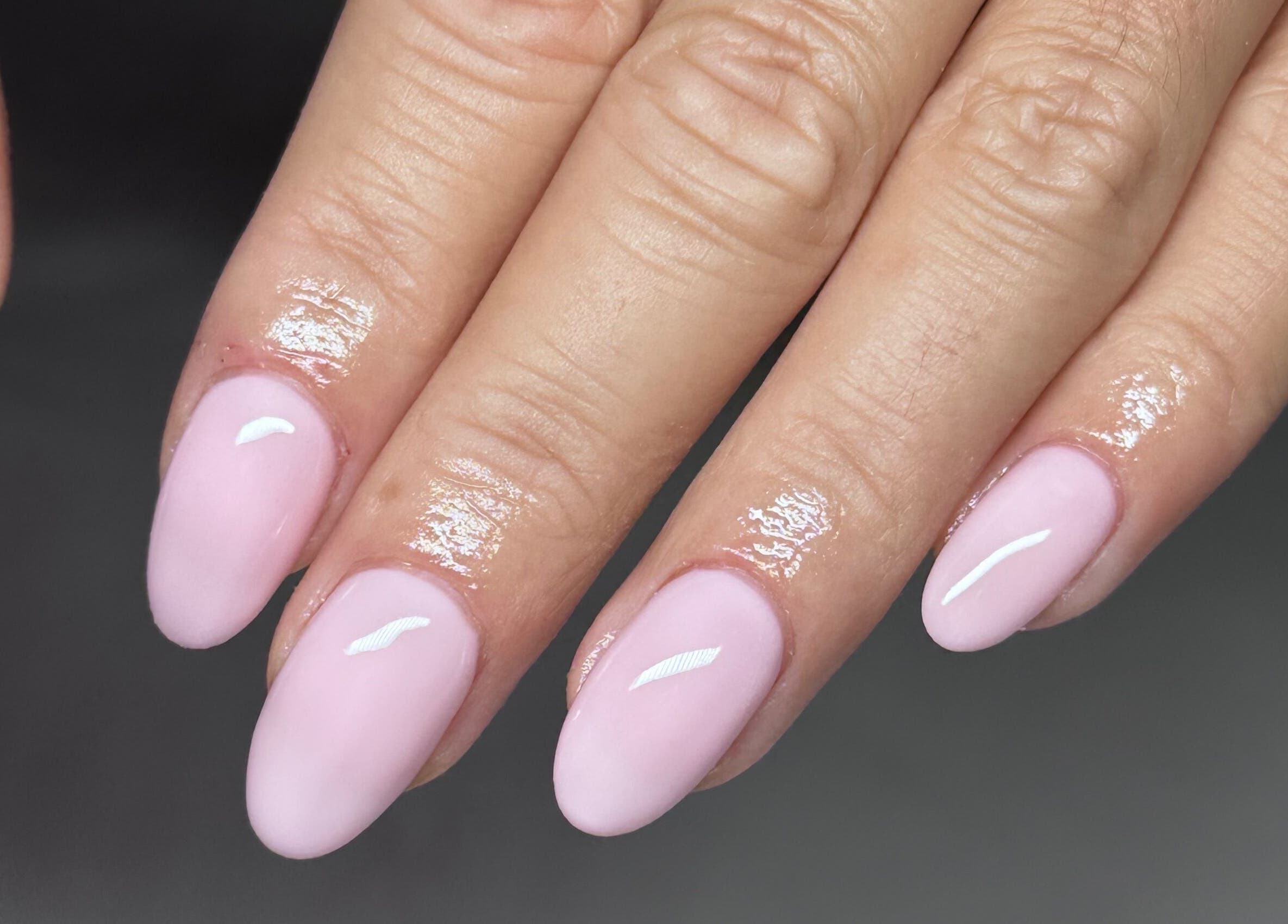 Elegant pastel pink manicure at Olive&Co salon, St Helier, JE.