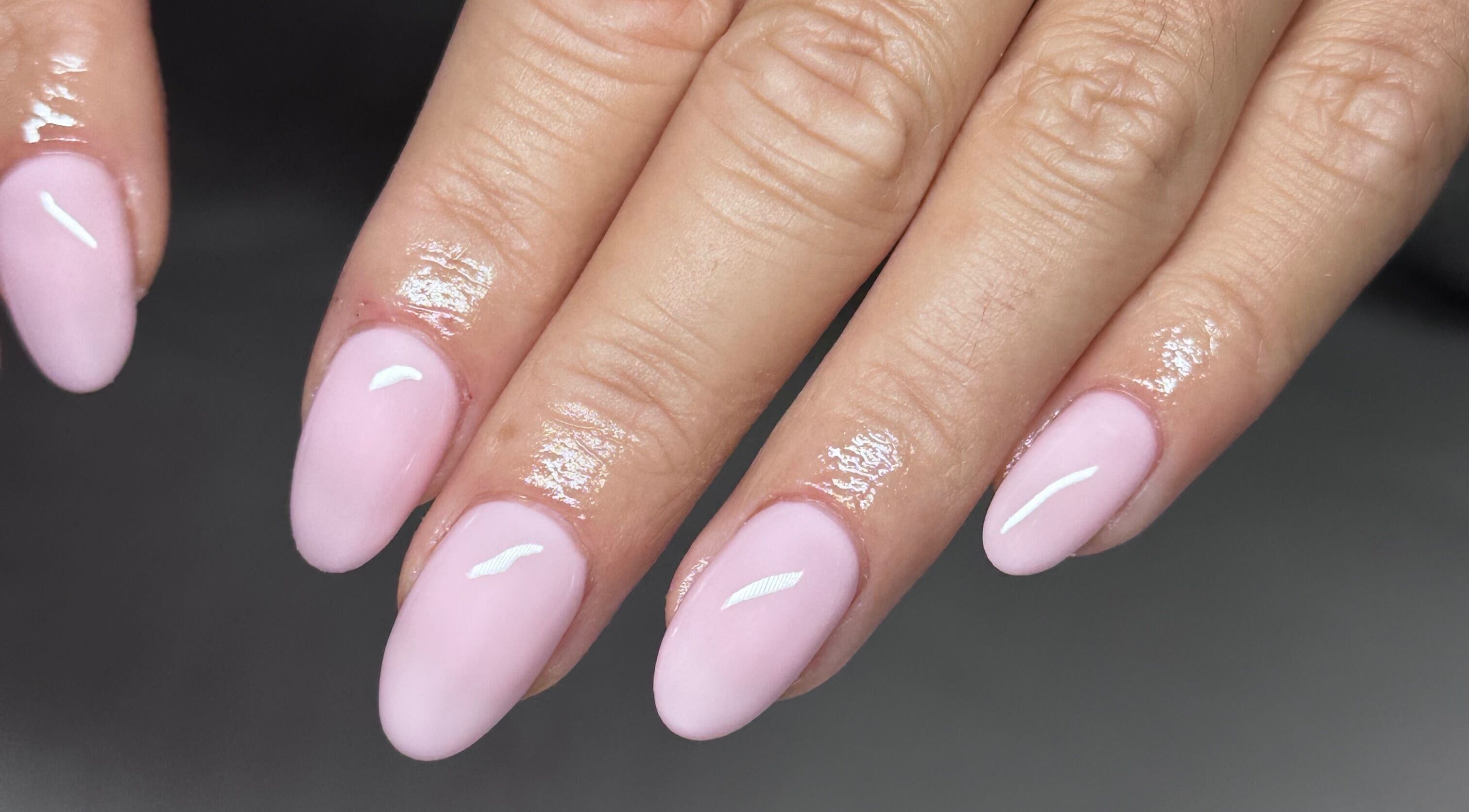 Elegant pastel pink manicure at Olive&Co salon, St Helier, JE.
