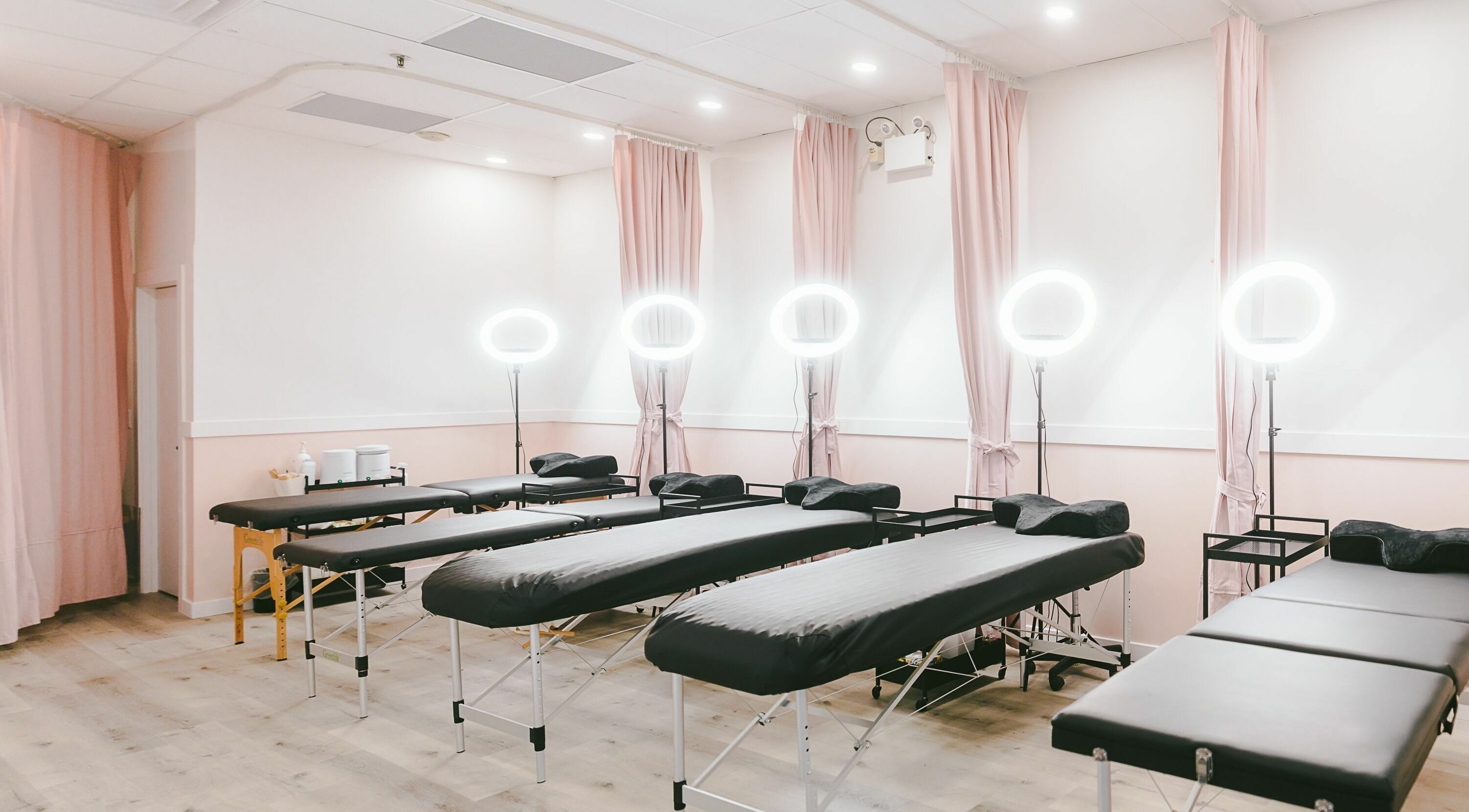 Modern spa interior at Beauty Palace Studio, Burnaby, British Columbia, CA with soothing lighting and treatment beds.