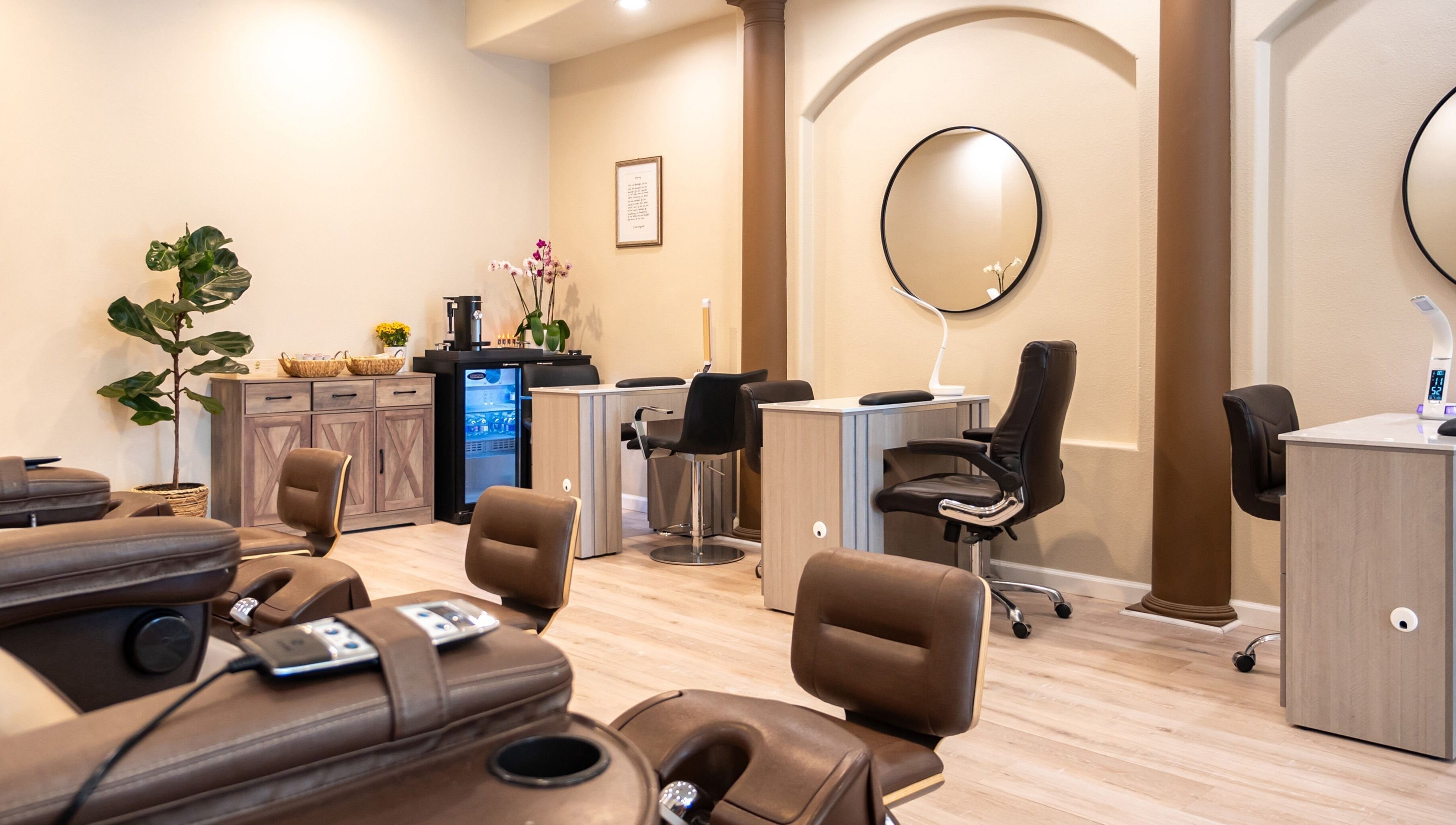 Chic interior of Nirvana Nails Studio, Studio City, California, offering luxurious wellness ambiance.