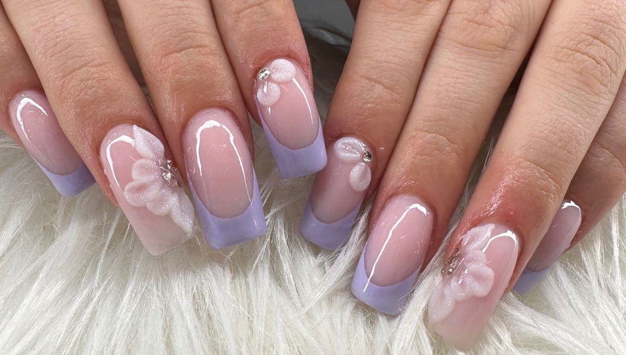 Elegant lavender French tip nails with delicate floral design at Beauty by Lily, Gosnells, Western Australia, AU.