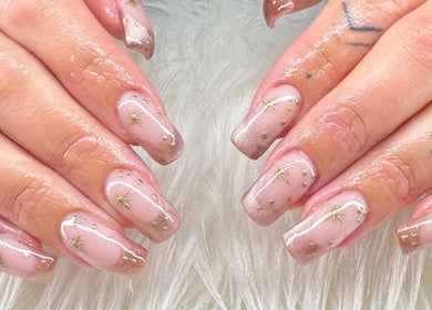 Elegant nail art with gold stars at Beauty by Lily, Gosnells, Western Australia, AU. Perfect manicure.