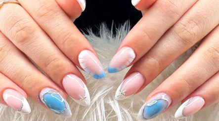 Elegant nail art featuring blue and white designs at Beauty by Lily, Gosnells, Western Australia, AU.