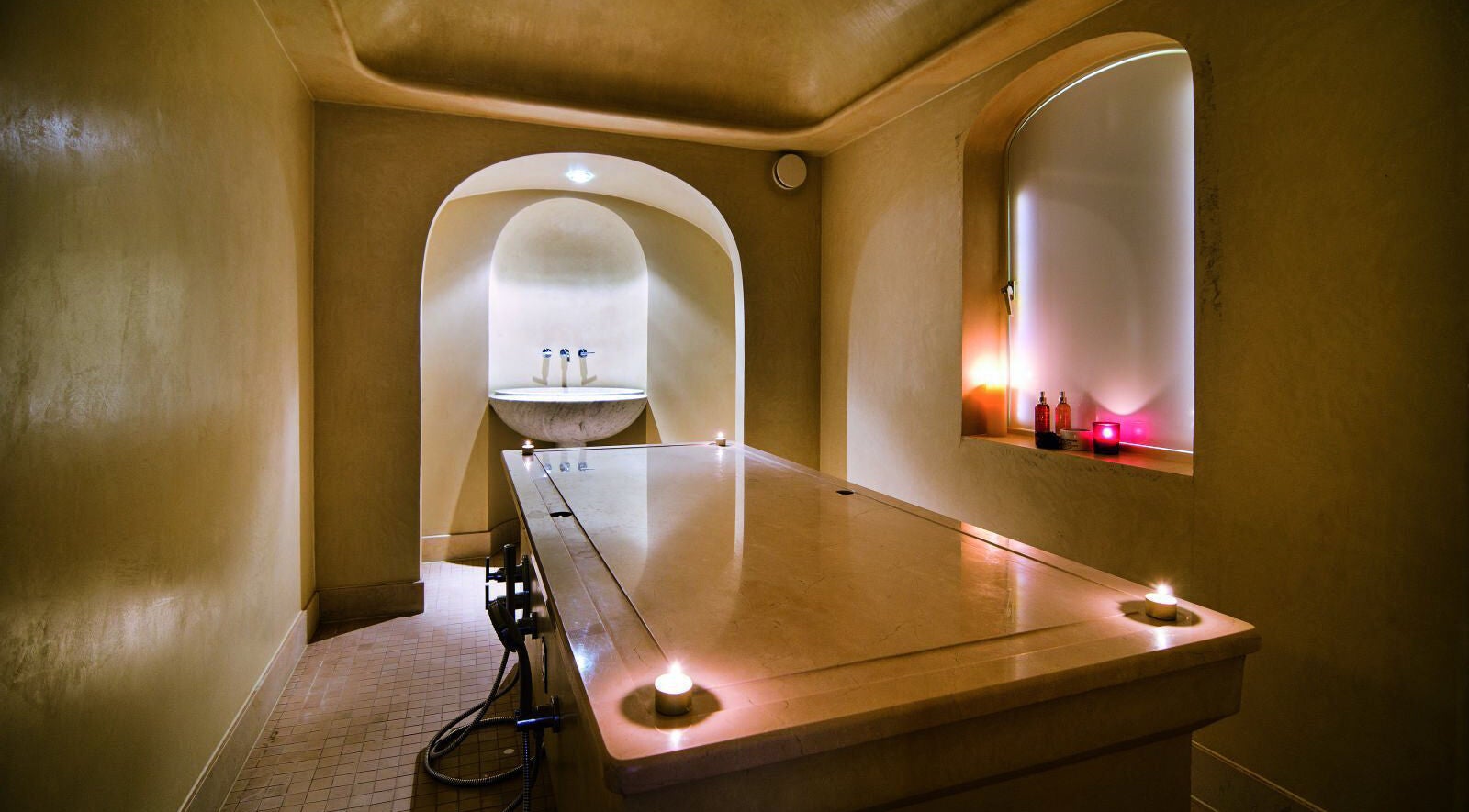 Elegant spa treatment room at Sofitel Legend The Grand Amsterdam, Amsterdam, Noord-Holland, NL with ambient lighting.