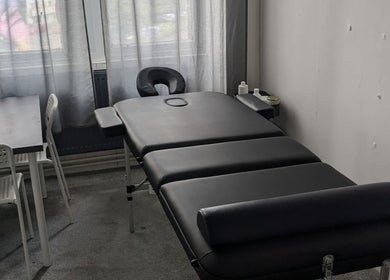 Massage table and seating area at Garry Christie Sports Massage, Glasgow, Scotland, GB.
