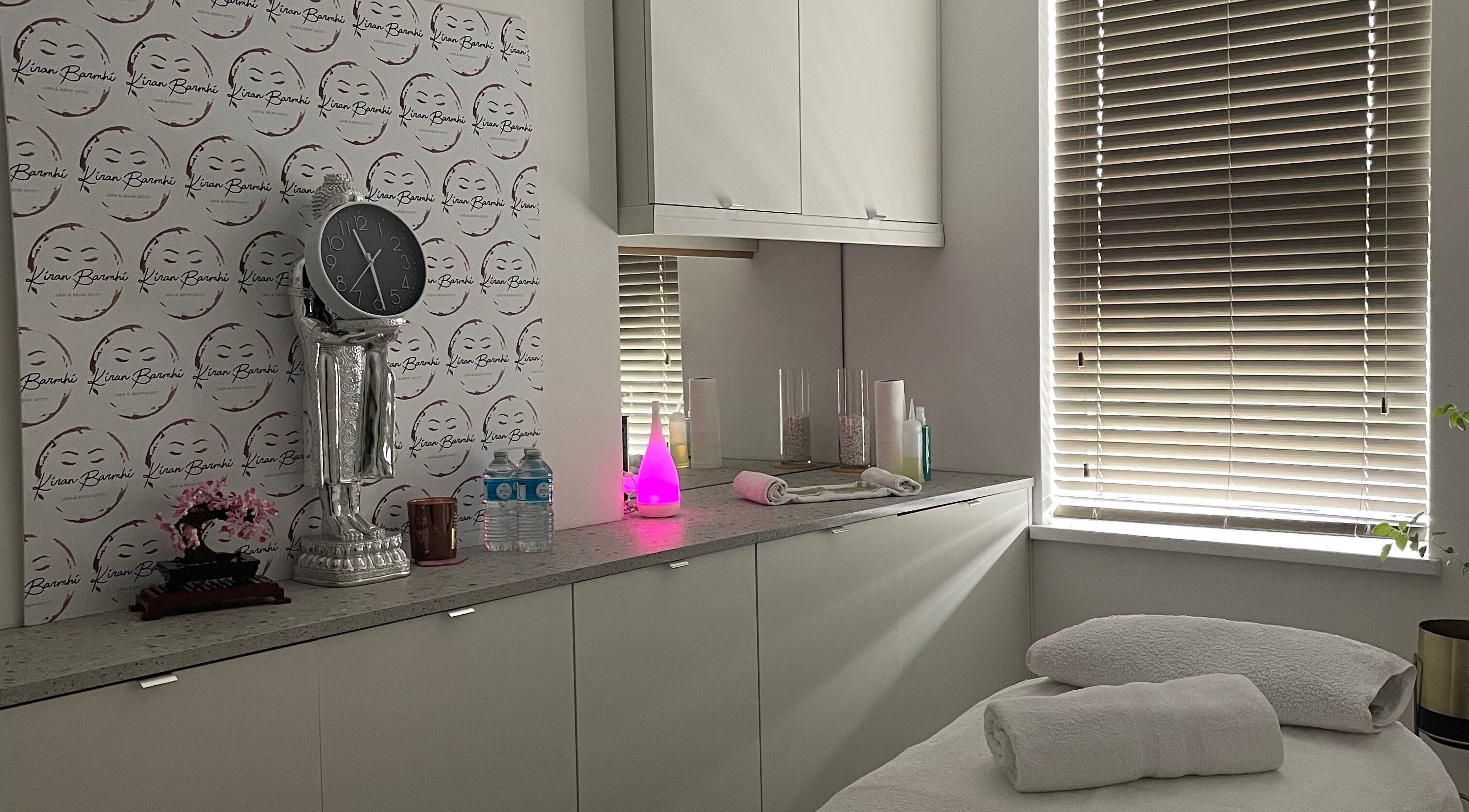 Cozy treatment room at Kiran Barmhi Beauty and Massage Therapist, Birmingham, England, GB, with soft lighting.