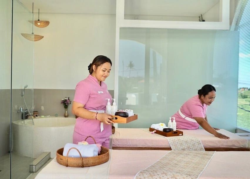 Asera Nail & Spa in Bali offers a relaxing spa experience with two therapists preparing treatment rooms.