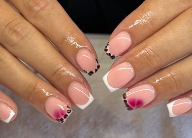 Elegant nail art design at BIAB BY FREYA in Nuneaton, England, GB showcasing stylish french tips.