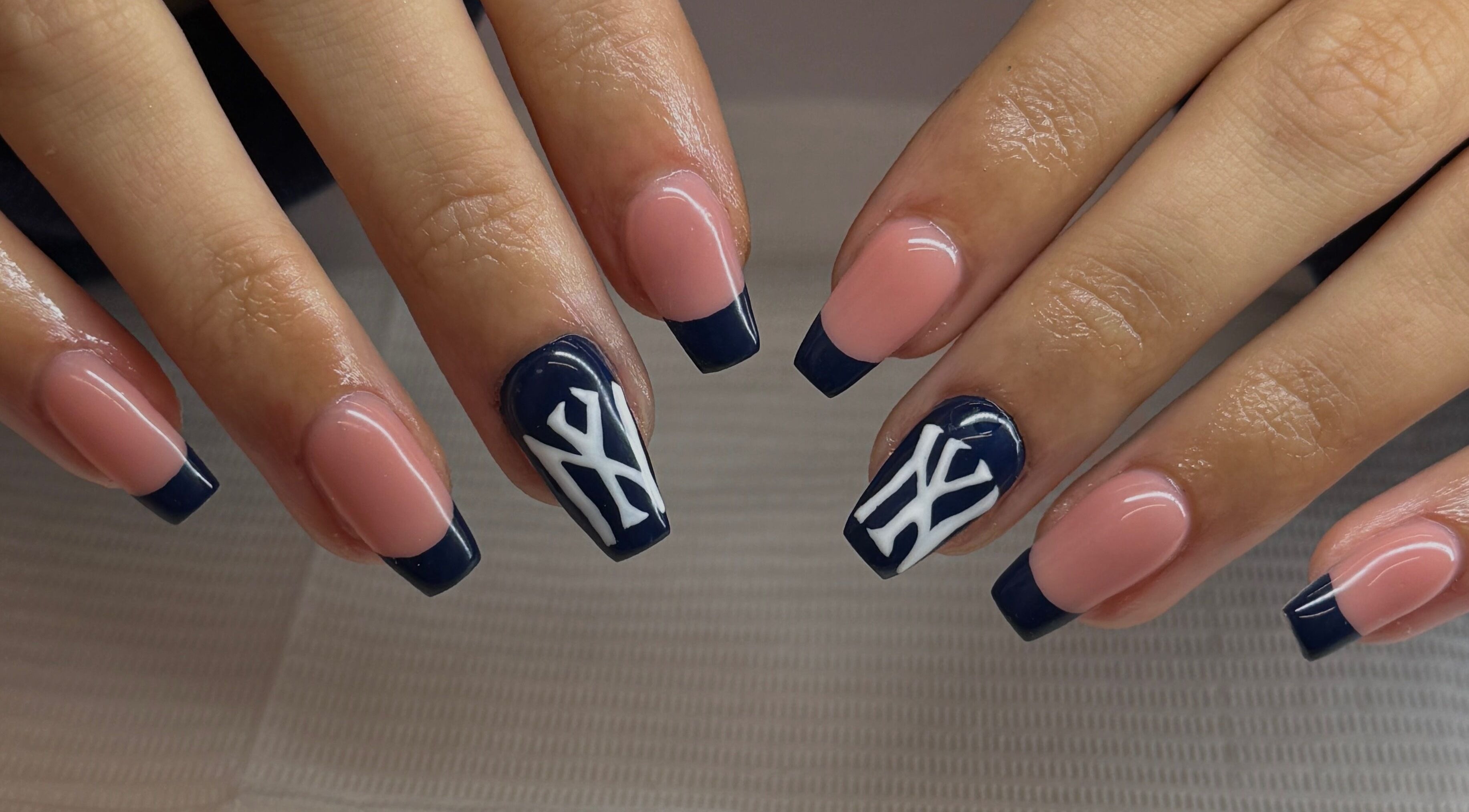 Navy and pink nail art at FLAWLESS - By Freya, Nuneaton, England, GB showcasing elegant design.