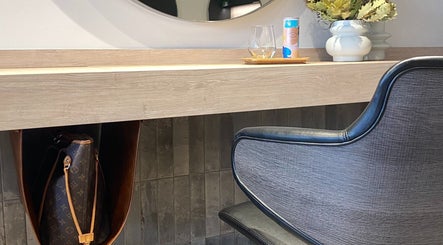 Modern salon workspace with a sleek chair at Clipso Hair in Castlecrag, NSW, AU.