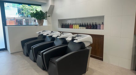 Elegant wash stations at Salon Lio, Crows Nest, New South Wales, AU offering luxury beauty experiences.