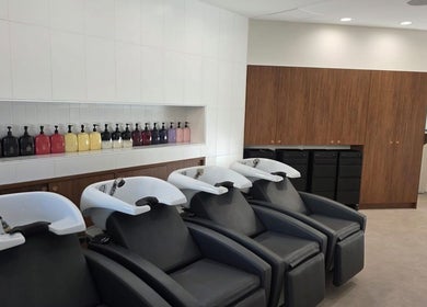 Salon Lio's modern shampoo stations in Crows Nest, New South Wales, AU with sleek design and premium products.