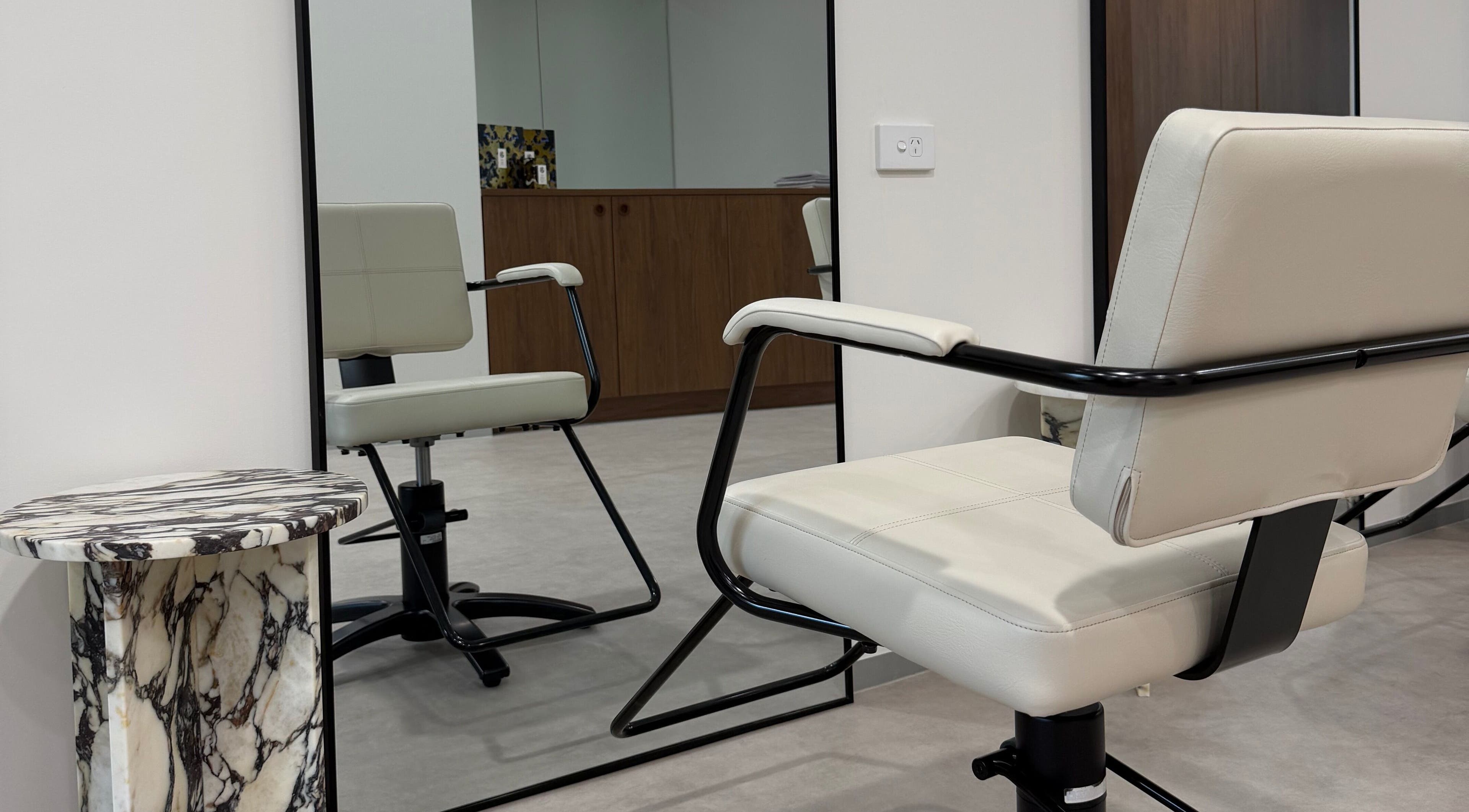 Modern styling chair and marble table at Salon Lio, Crows Nest, New South Wales, AU.