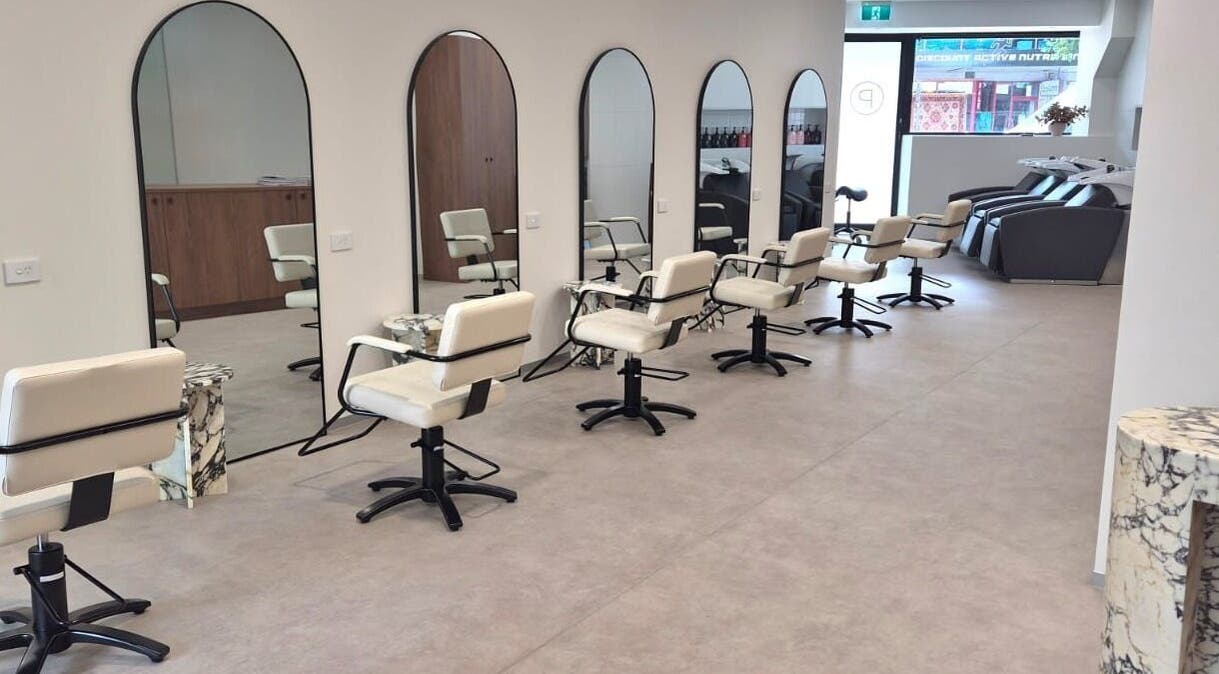 Elegant styling chairs and mirrors at Salon Lio, Crows Nest, New South Wales, AU.
