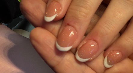 Glamorous French manicure at K G Beauty, Edinburgh, Scotland, GB. Perfect glossy finish with sparkles.