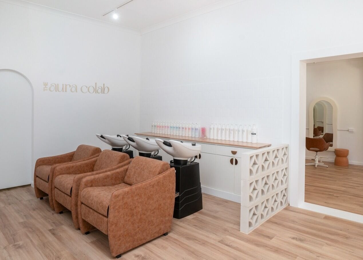 Elegant salon chairs at The Aura Colab, Loftus, New South Wales, AU - inviting atmosphere for beauty treatments.