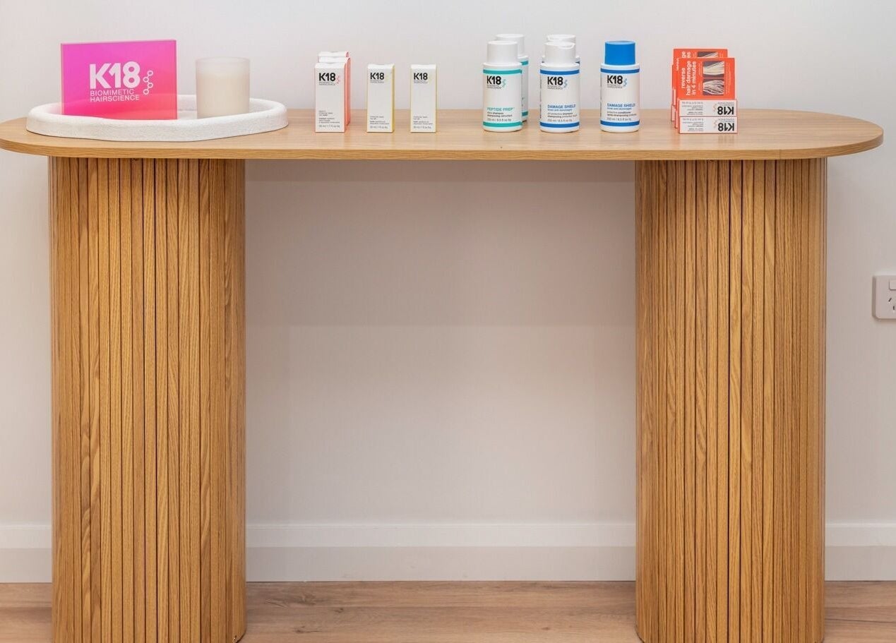 Stylish haircare product arrangement at The Aura Colab, Loftus, New South Wales, AU.