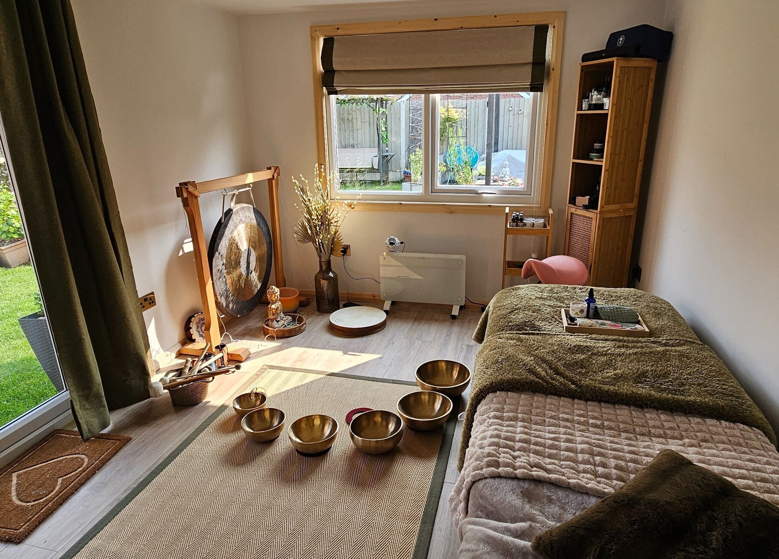 Relaxing therapy room with Tibetan bowls at Calm by Nature Reflexology in Bromborough, England, GB.