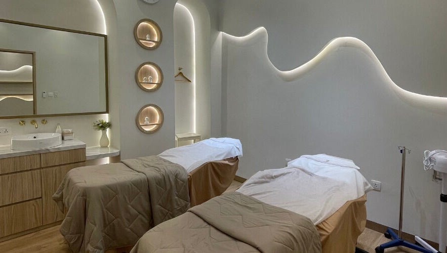 Calm spa room with two massage beds at Skin Central, Batam, Kepulauan Riau, ID.