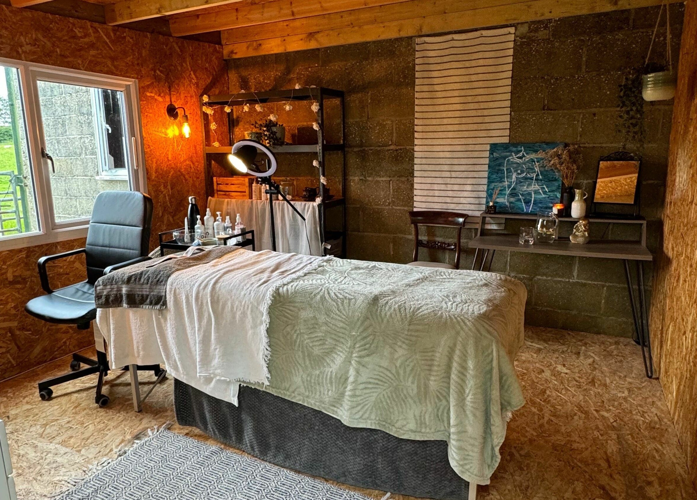 Cozy treatment room at The Mulberry Tree, Radwinter, England, GB with a serene atmosphere for wellness.