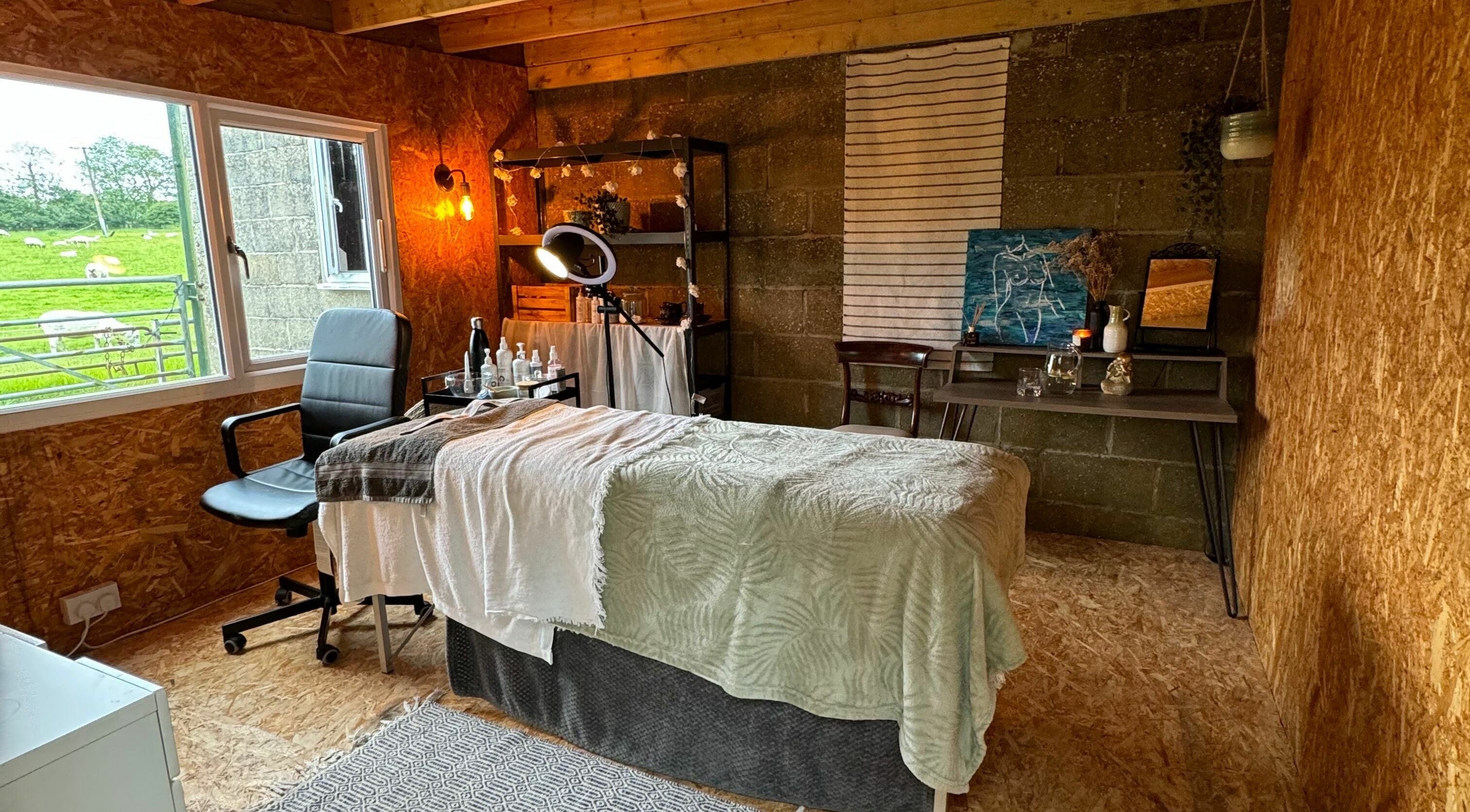 Cozy treatment room at The Mulberry Tree, Radwinter, England, GB with a serene atmosphere for wellness.