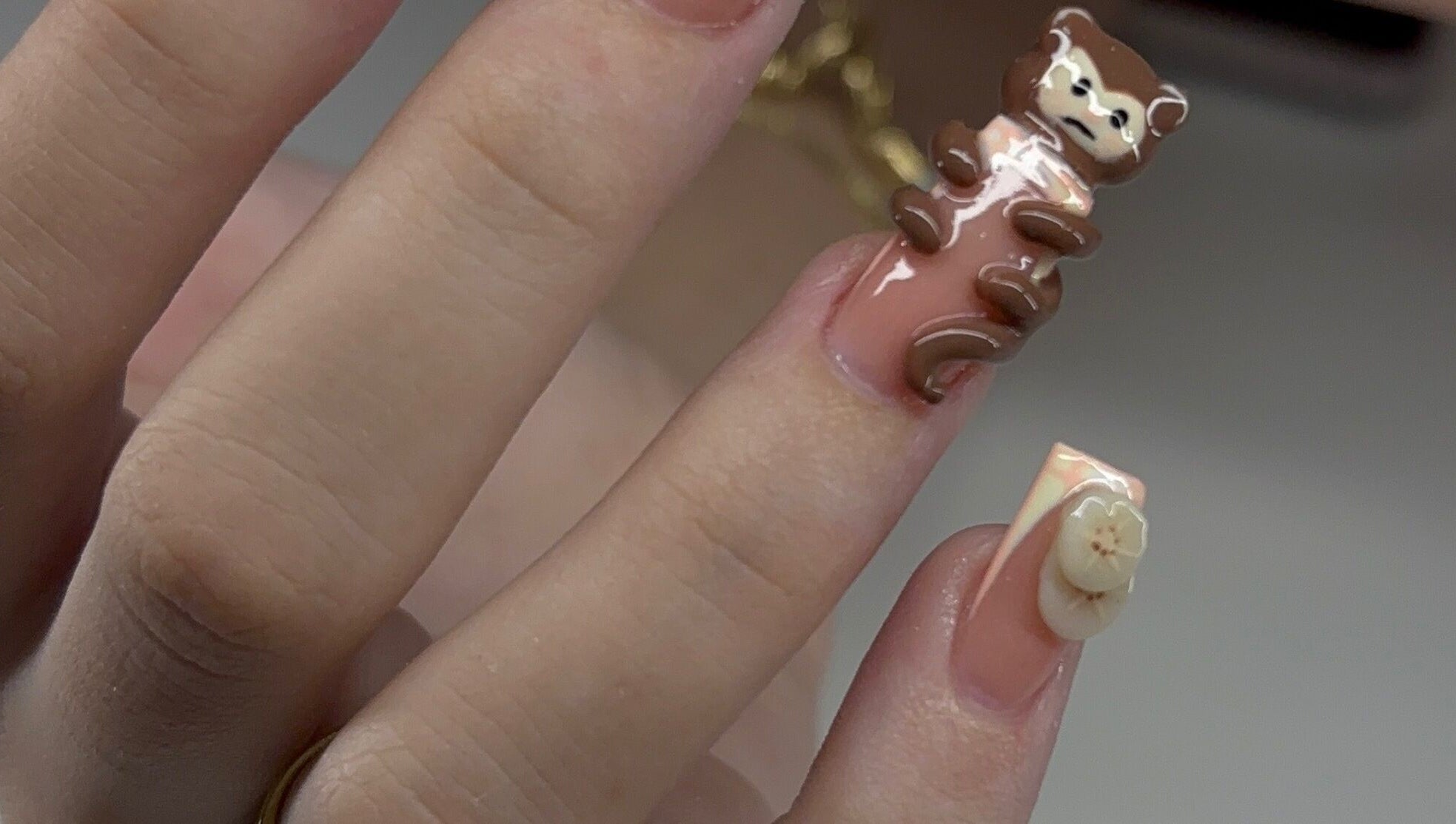 Unique bear nail art at Devine Essence, Willemstad, CW, showcases creative manicure designs.